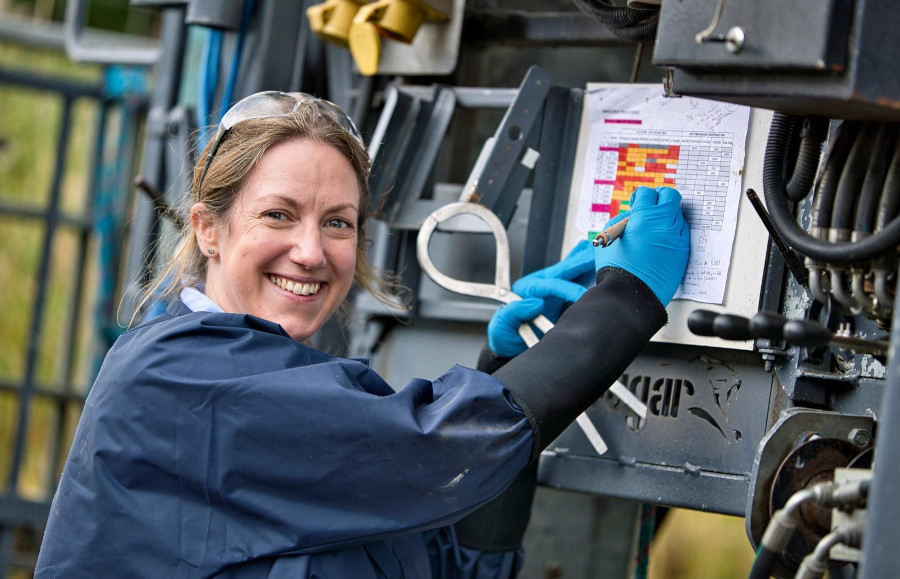 Sara Pedersen filling forms for cow lameness checks